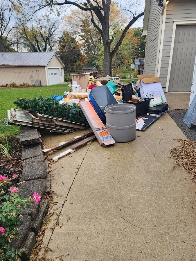 Dumpster being loaded with debris for 3 Yard Dumpster Rental in Allentown